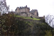Edinburgh Castle from Prince's street with a frame of budding trees